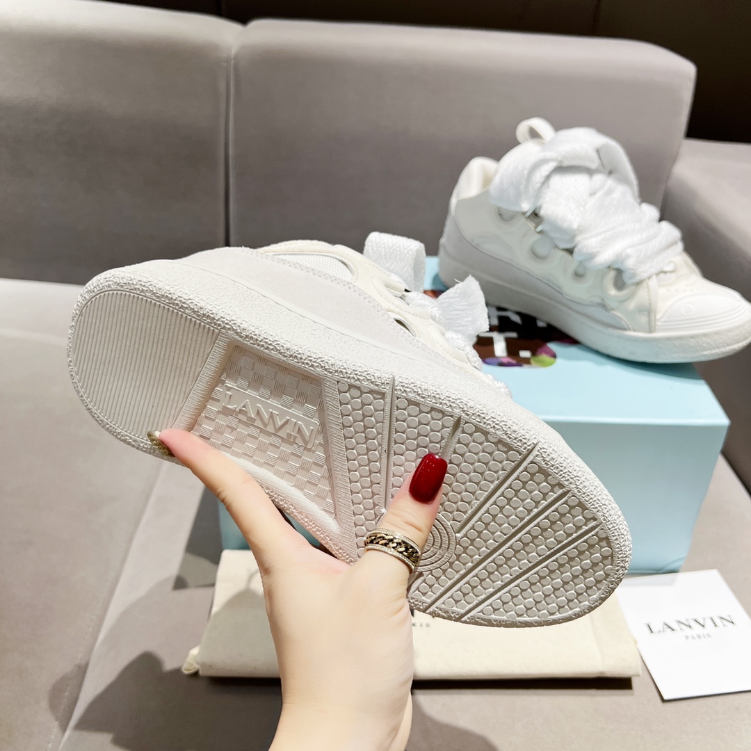 Lanvin Curb Leather Sneakers - FashionPlug