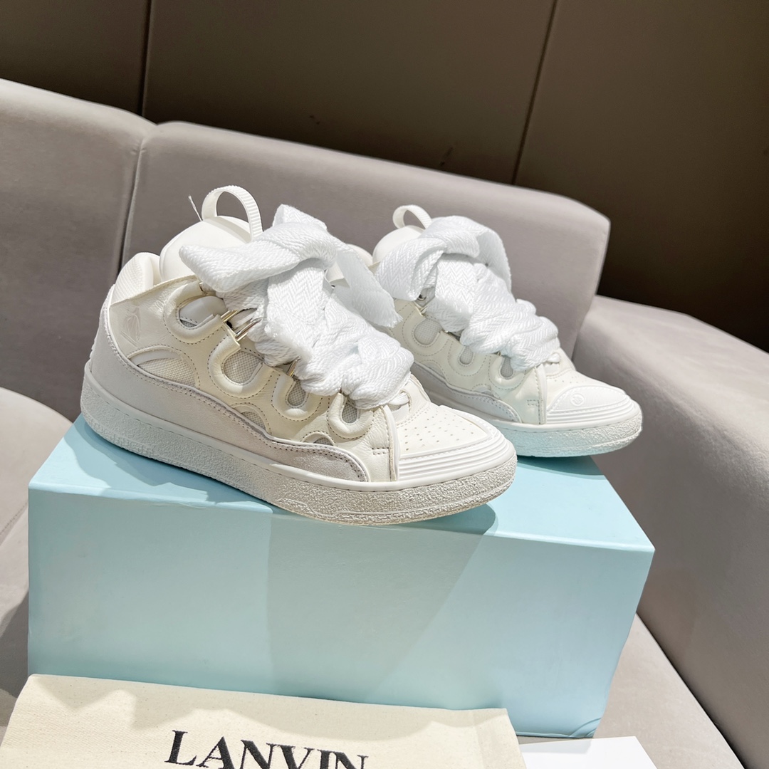 Lanvin Curb Leather Sneakers - FashionPlug
