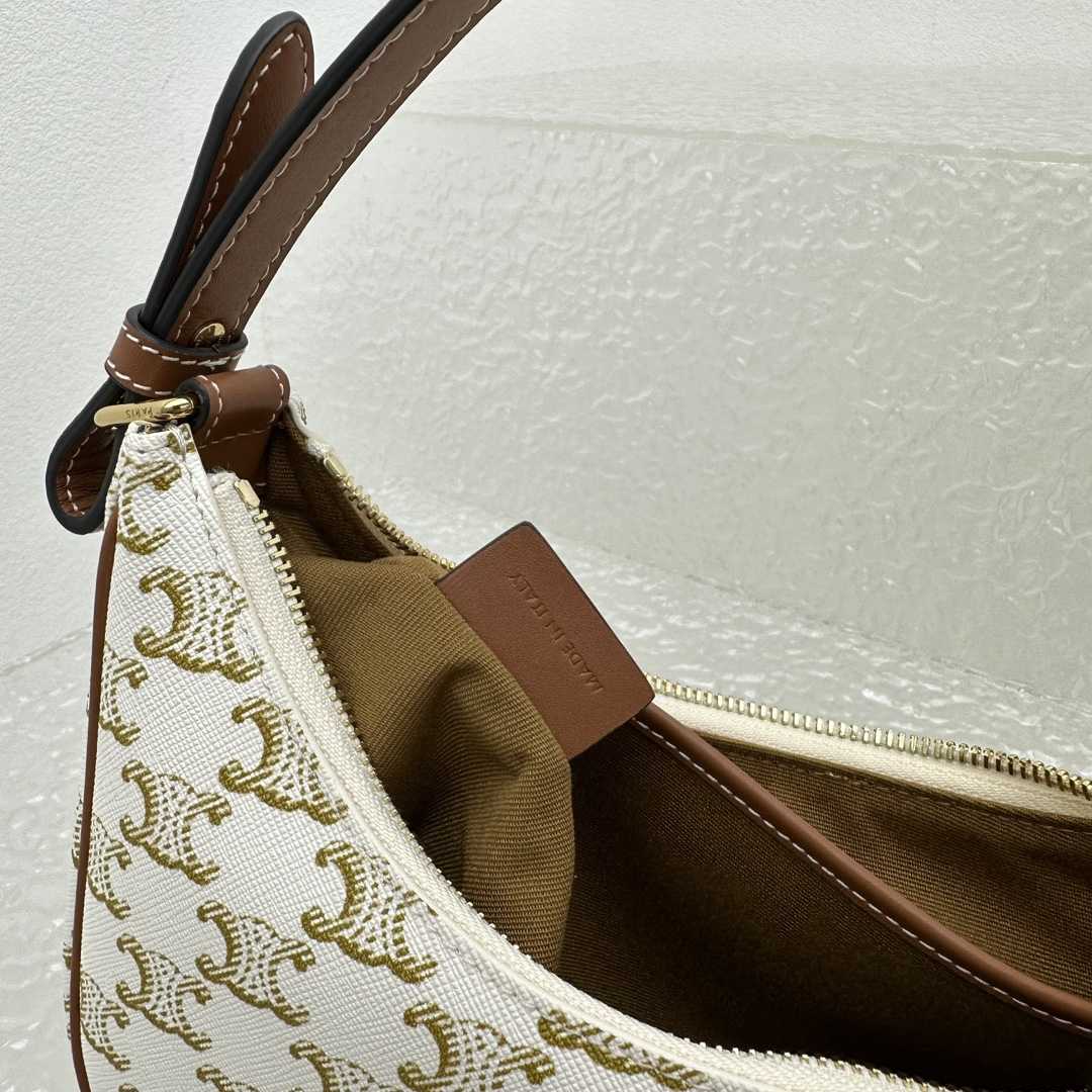 Celine Ava Triomphe Soft Bag In Triomphe Canvas And Calfskin - FashionPlug