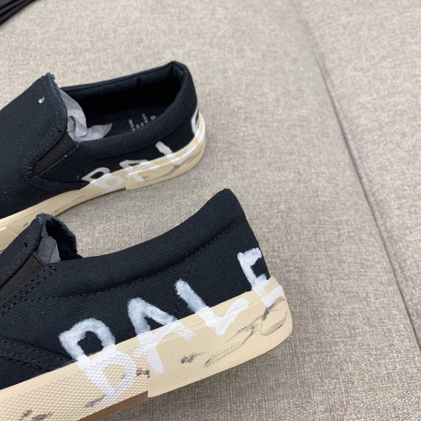 Balenciaga Paris Slip On Graffiti Sneaker In Black - FashionPlug