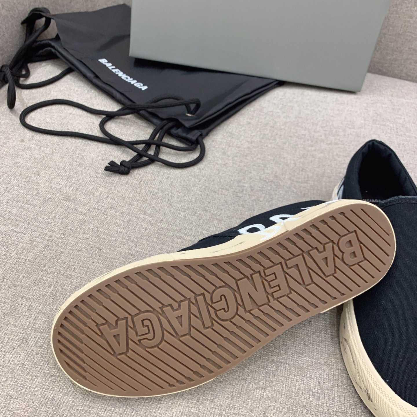 Balenciaga Paris Slip On Graffiti Sneaker In Black - FashionPlug