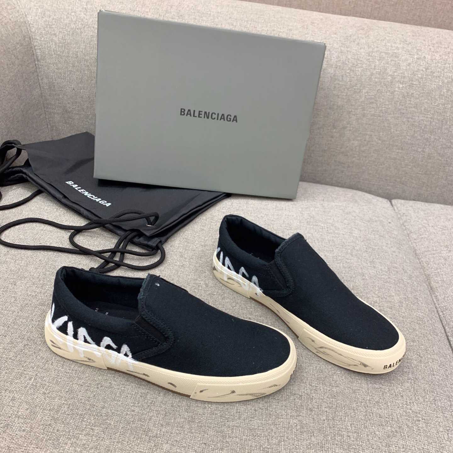 Balenciaga Paris Slip On Graffiti Sneaker In Black - FashionPlug