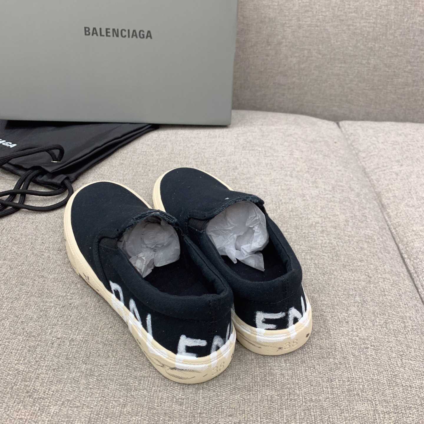 Balenciaga Paris Slip On Graffiti Sneaker In Black - FashionPlug