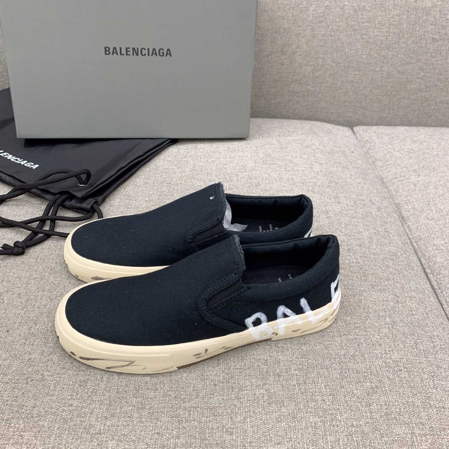 Balenciaga Paris Slip On Graffiti Sneaker In Black - FashionPlug