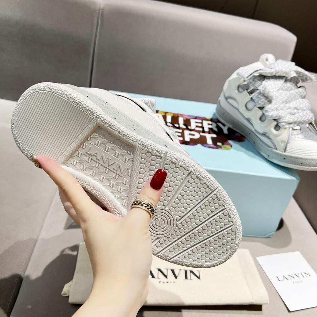 Lanvin Curb Leather Sneakers - FashionPlug