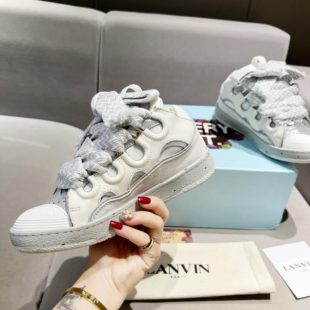 Lanvin Curb Leather Sneakers - FashionPlug