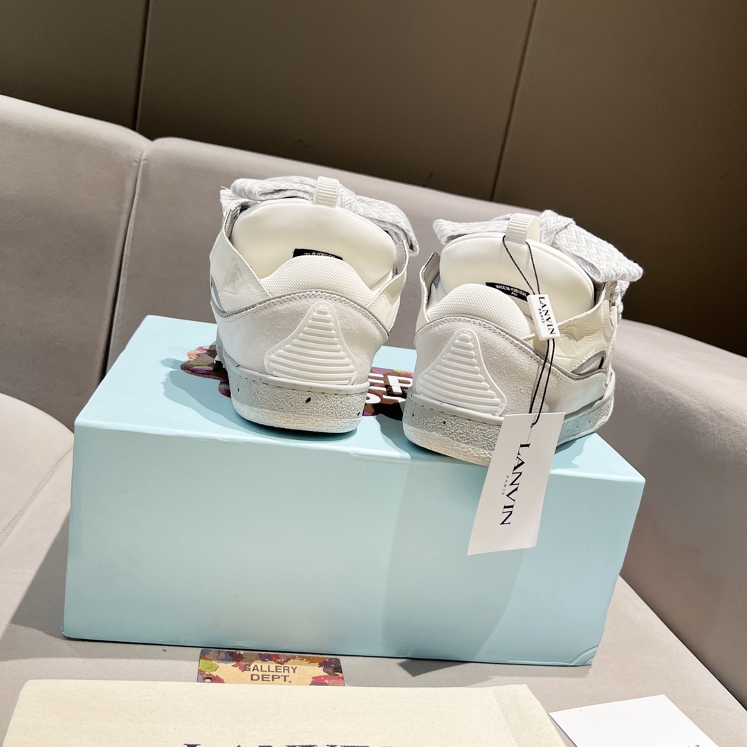 Lanvin Curb Leather Sneakers - FashionPlug
