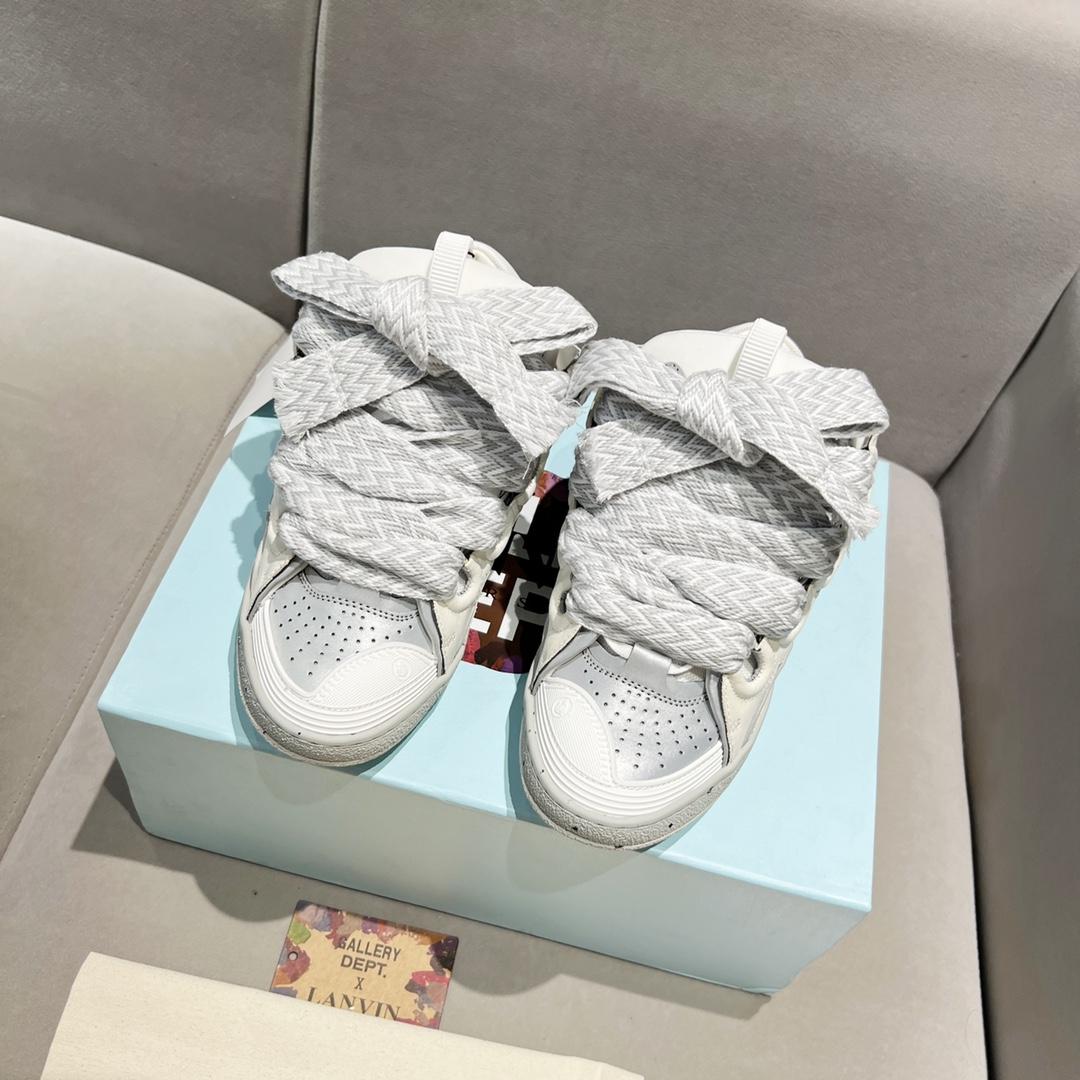 Lanvin Curb Leather Sneakers - FashionPlug