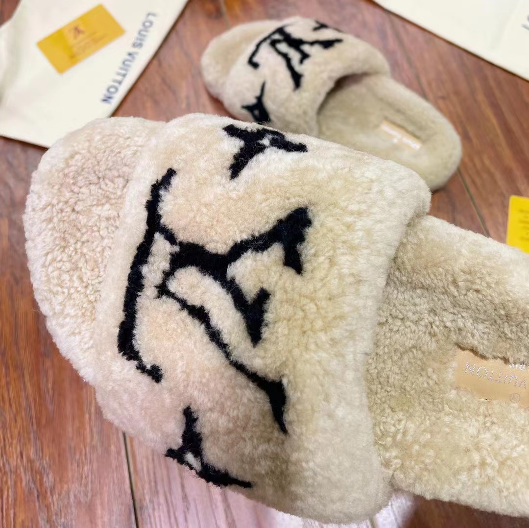 Louis Vuitton Shearling Slides - FashionPlug