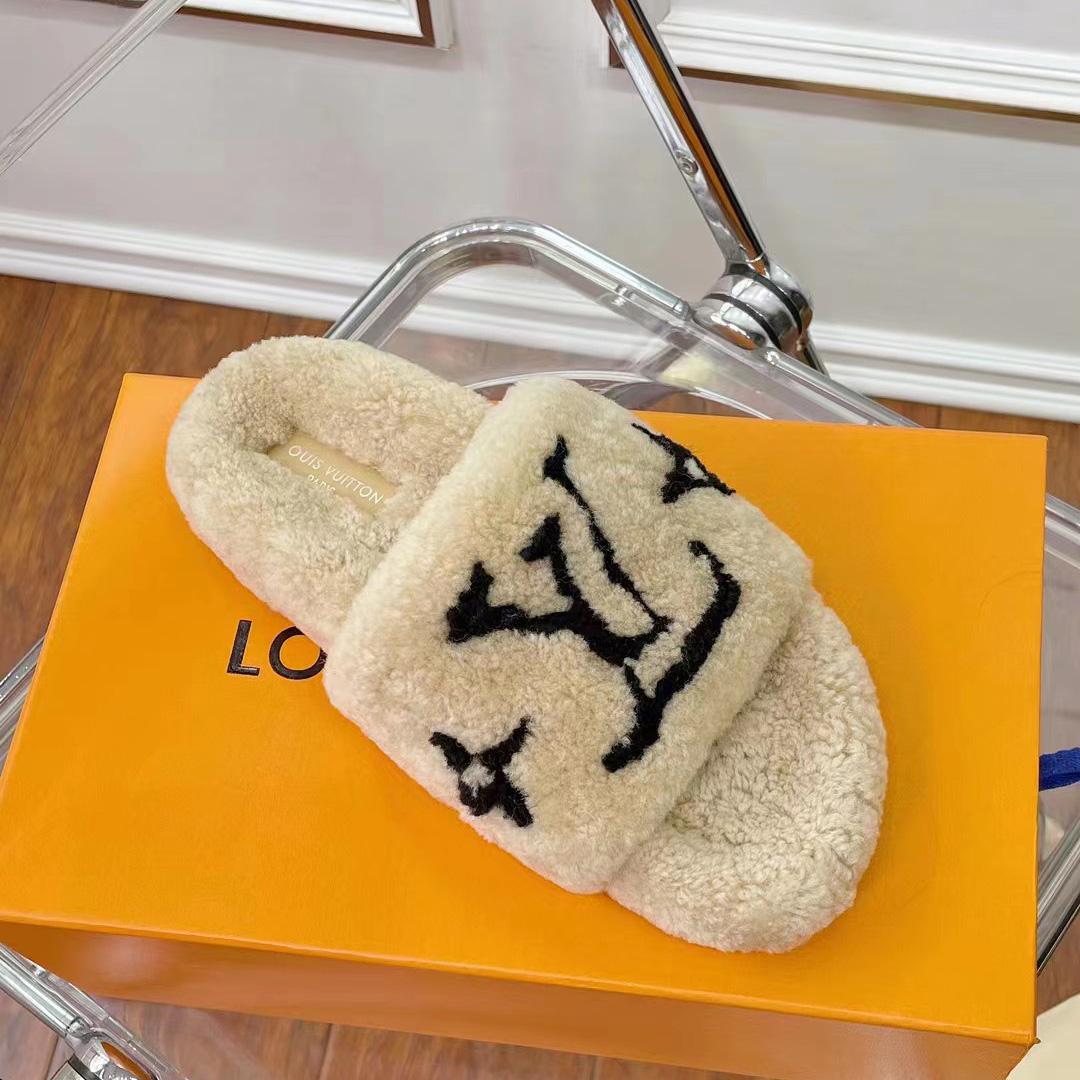 Louis Vuitton Shearling Slides - FashionPlug