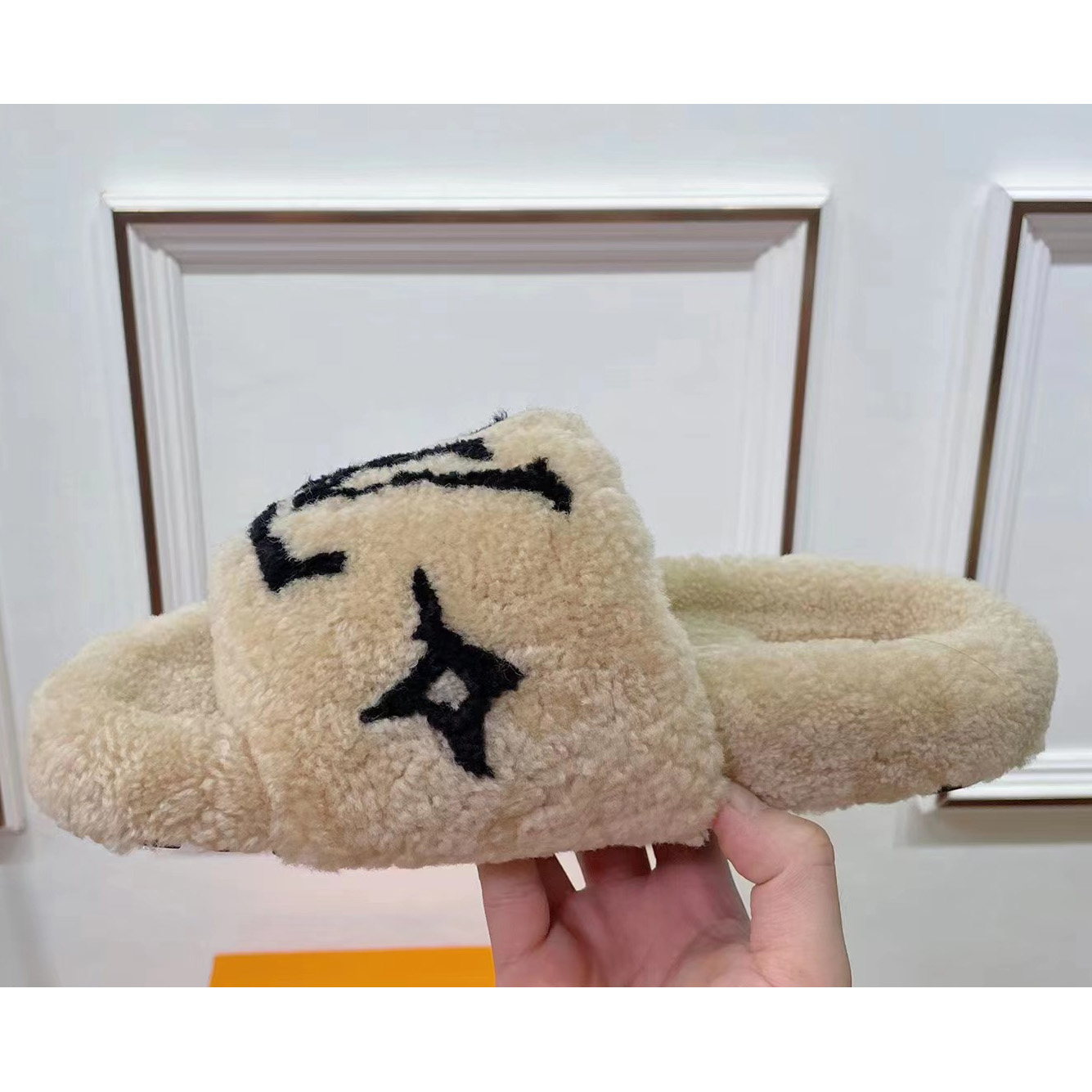 Louis Vuitton Shearling Slides - FashionPlug