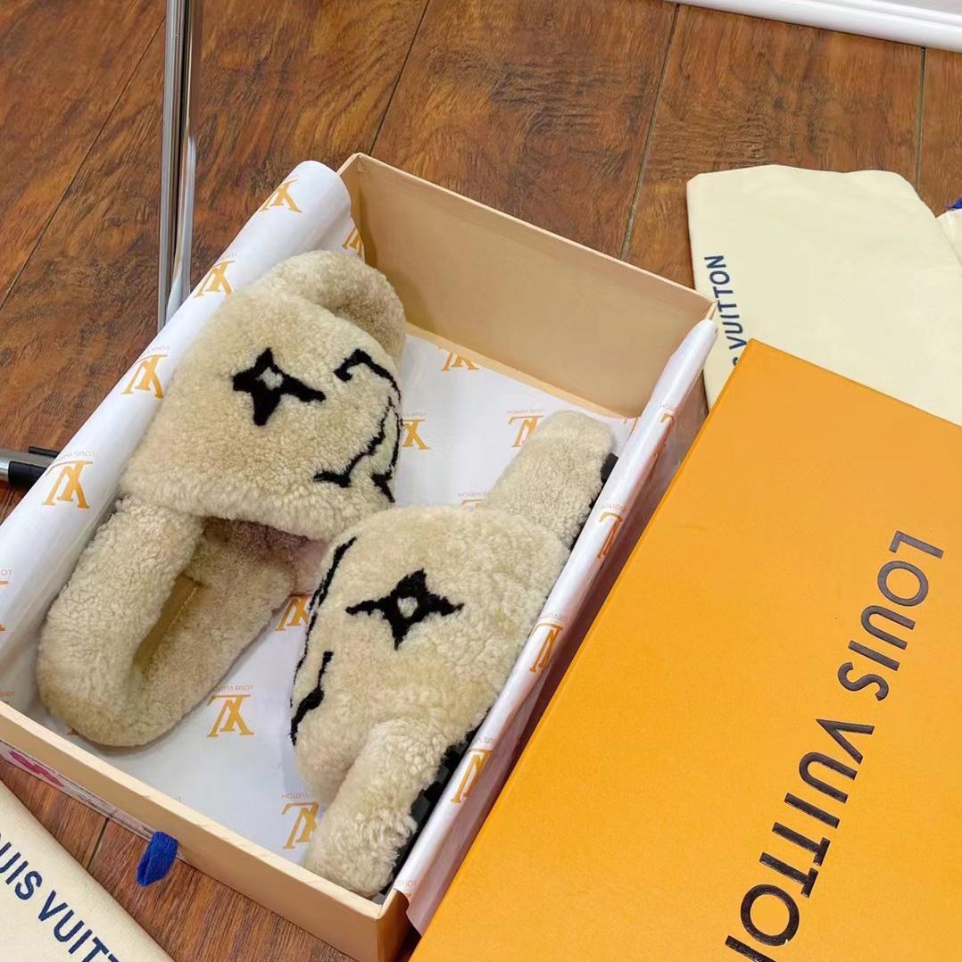 Louis Vuitton Shearling Slides - FashionPlug
