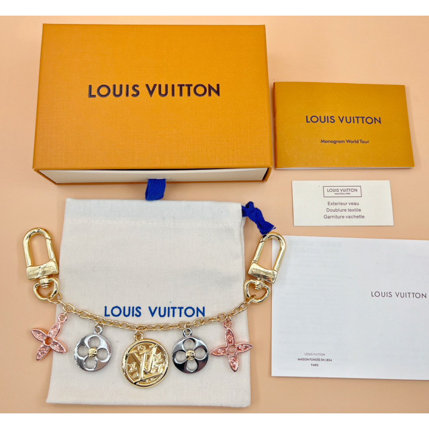 Louis Vuitton Nanogram Family Bag Charm   M01001 - FashionPlug