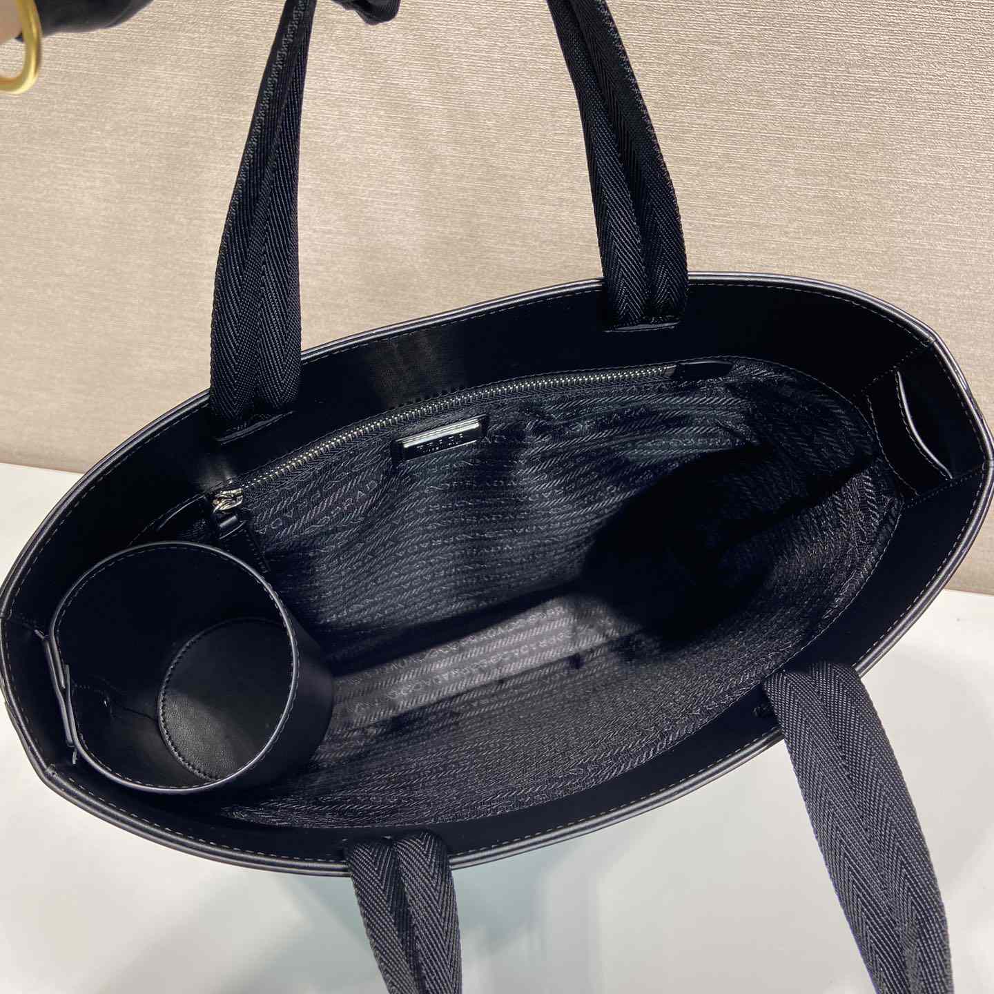 Prada Brushed Leather Tote Bag With Water Bottle - FashionPlug