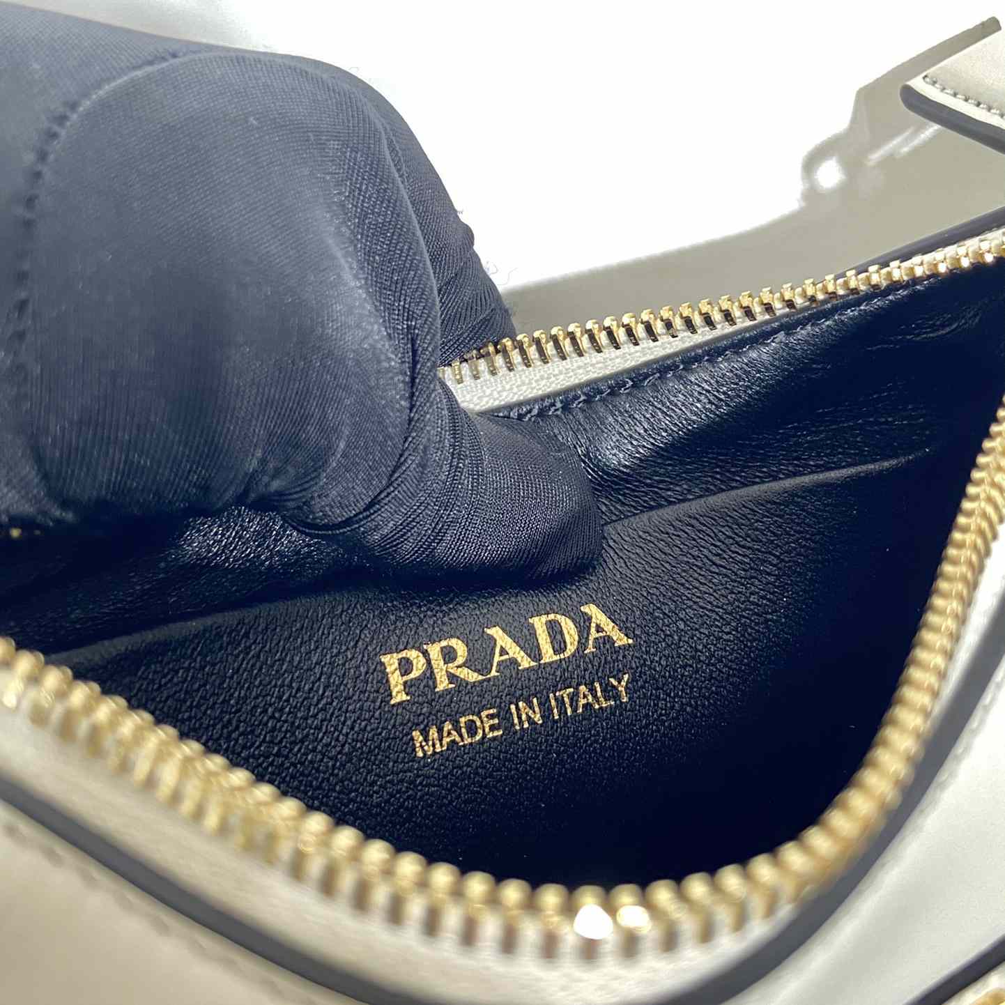Prada Arqué Leather Mini Shoulder Bag - FashionPlug