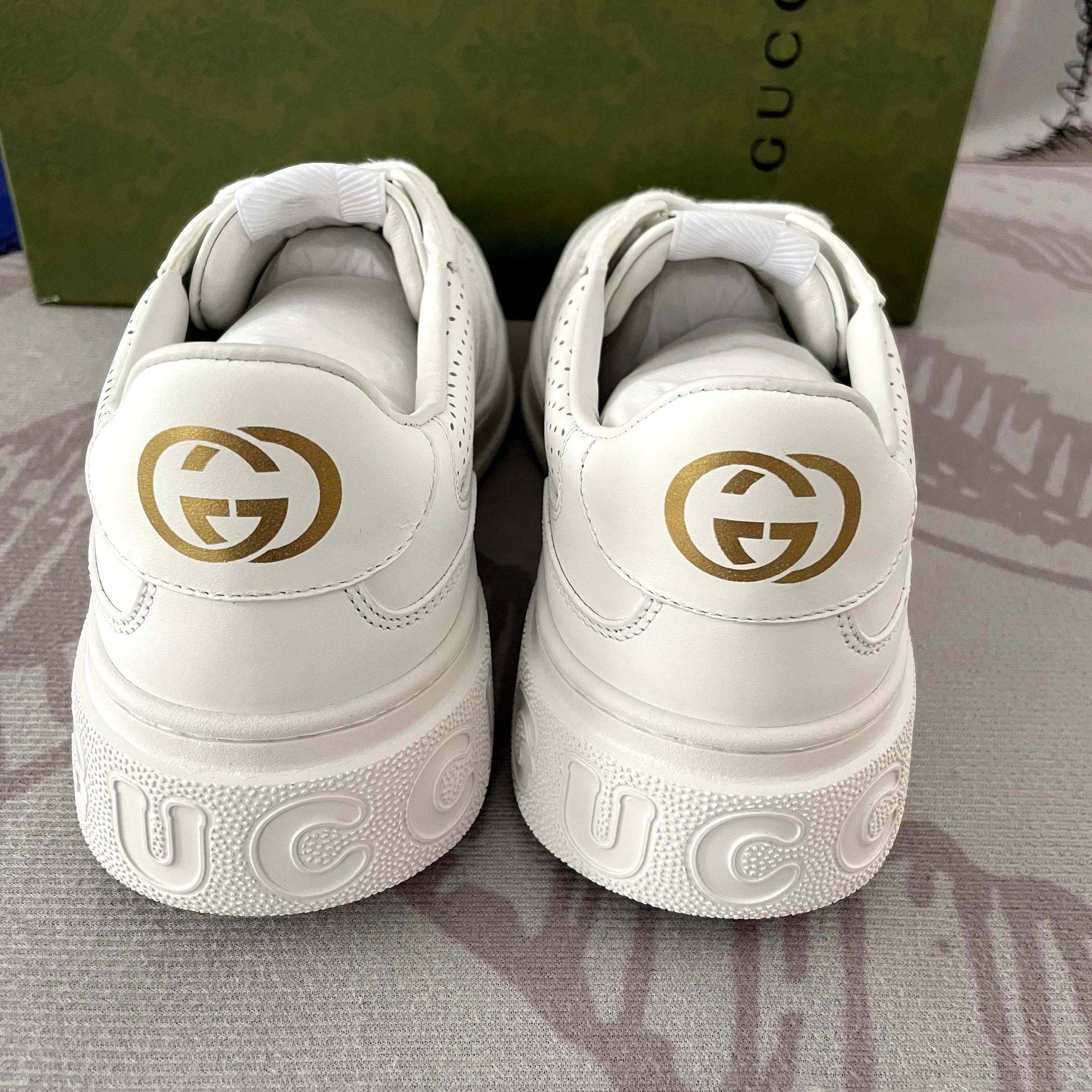 Gucci GG Embossed Sneaker - FashionPlug