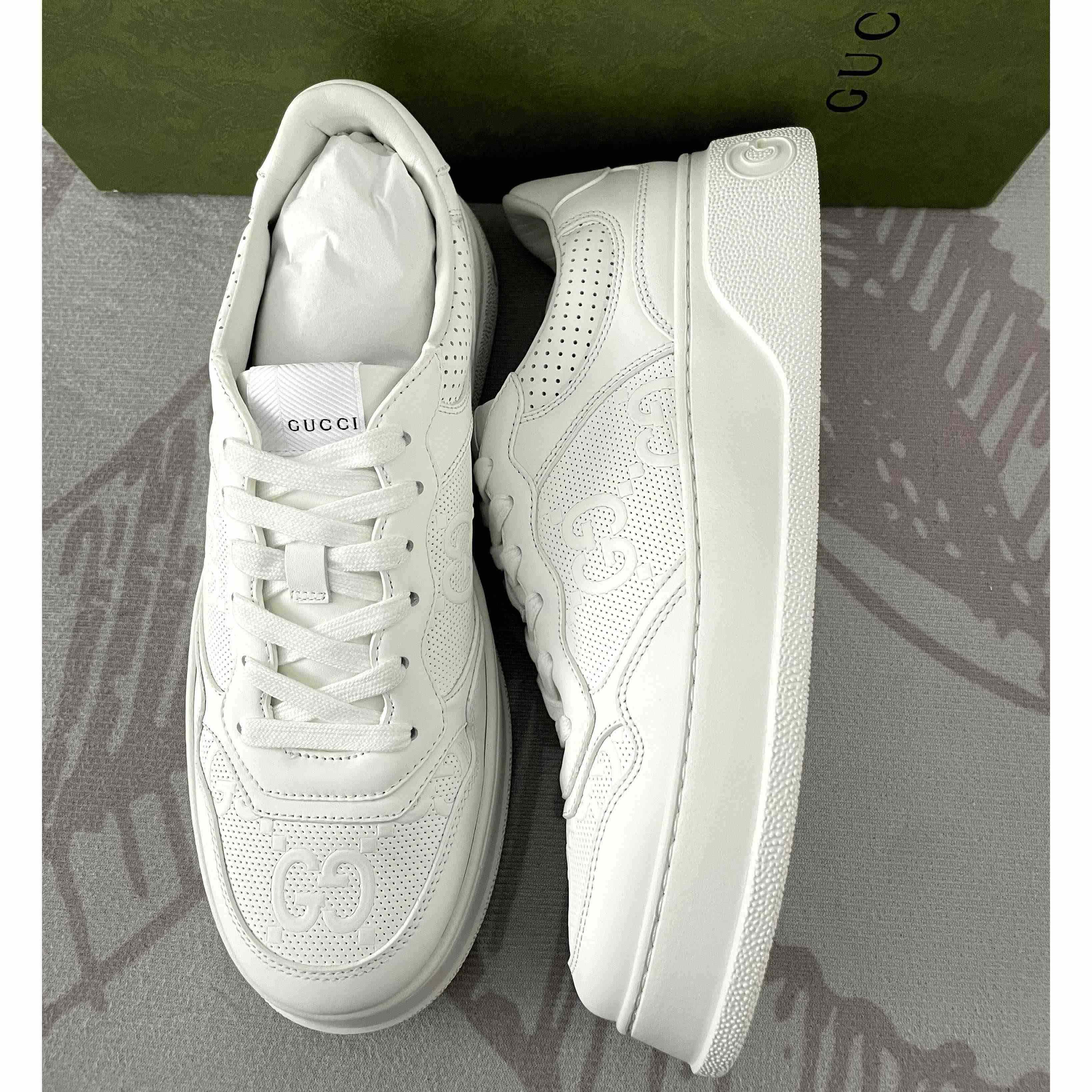 Gucci GG Embossed Sneaker - FashionPlug