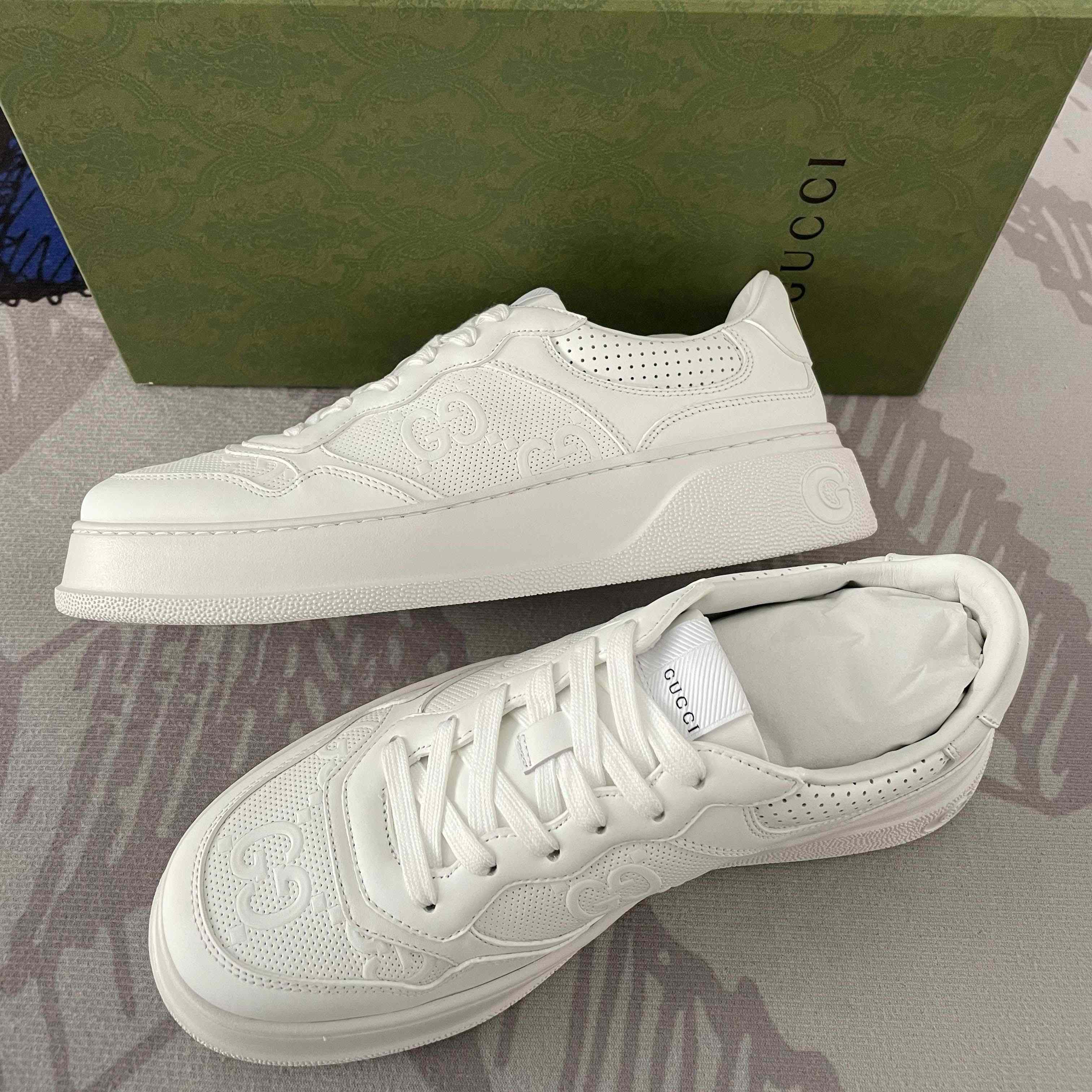 Gucci GG Embossed Sneaker - FashionPlug