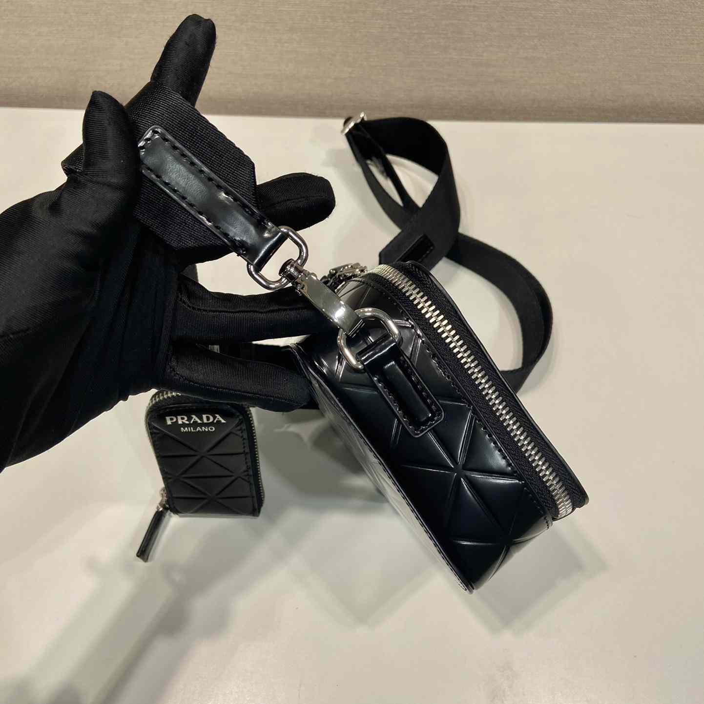 Prada Brique Brushed Leather Bag With Triangle Motif - FashionPlug