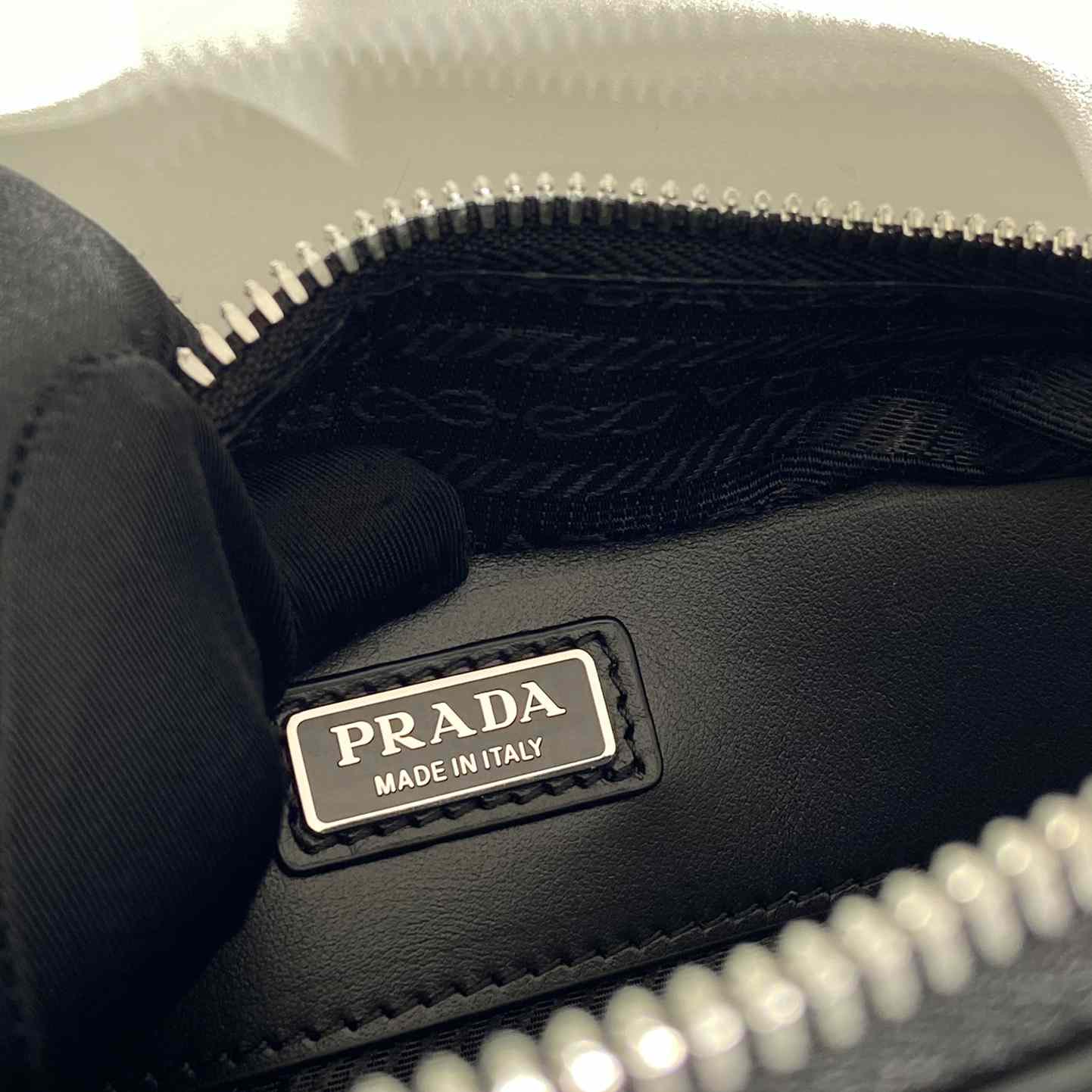 Prada Brique Brushed Leather Bag With Triangle Motif - FashionPlug