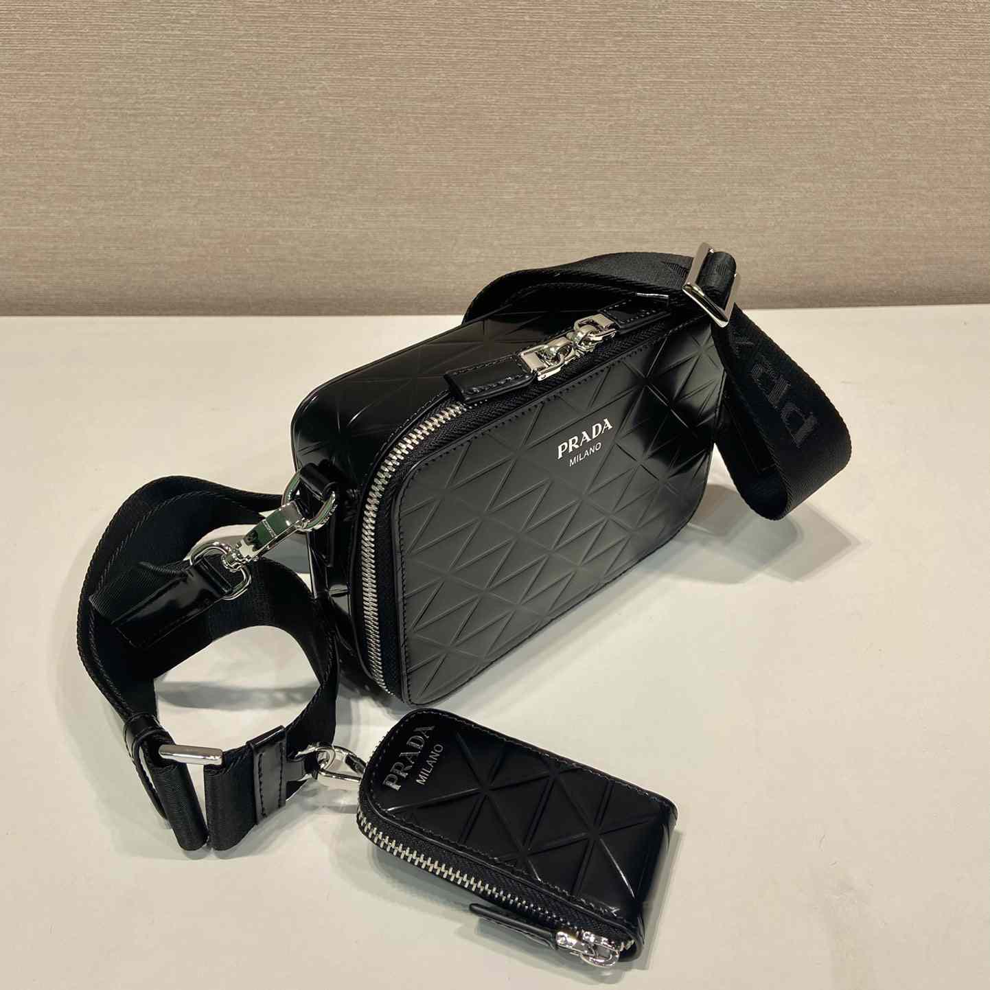 Prada Brique Brushed Leather Bag With Triangle Motif - FashionPlug
