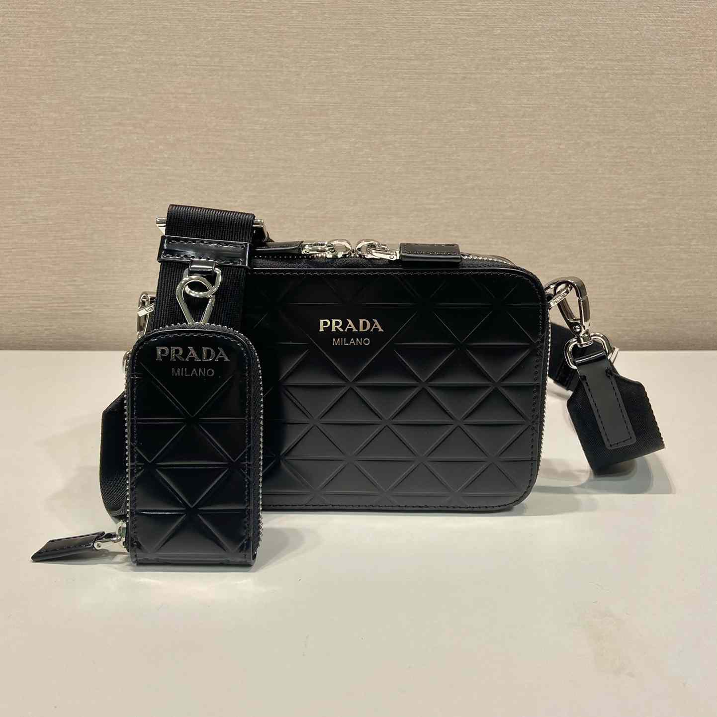 Prada Brique Brushed Leather Bag With Triangle Motif - FashionPlug
