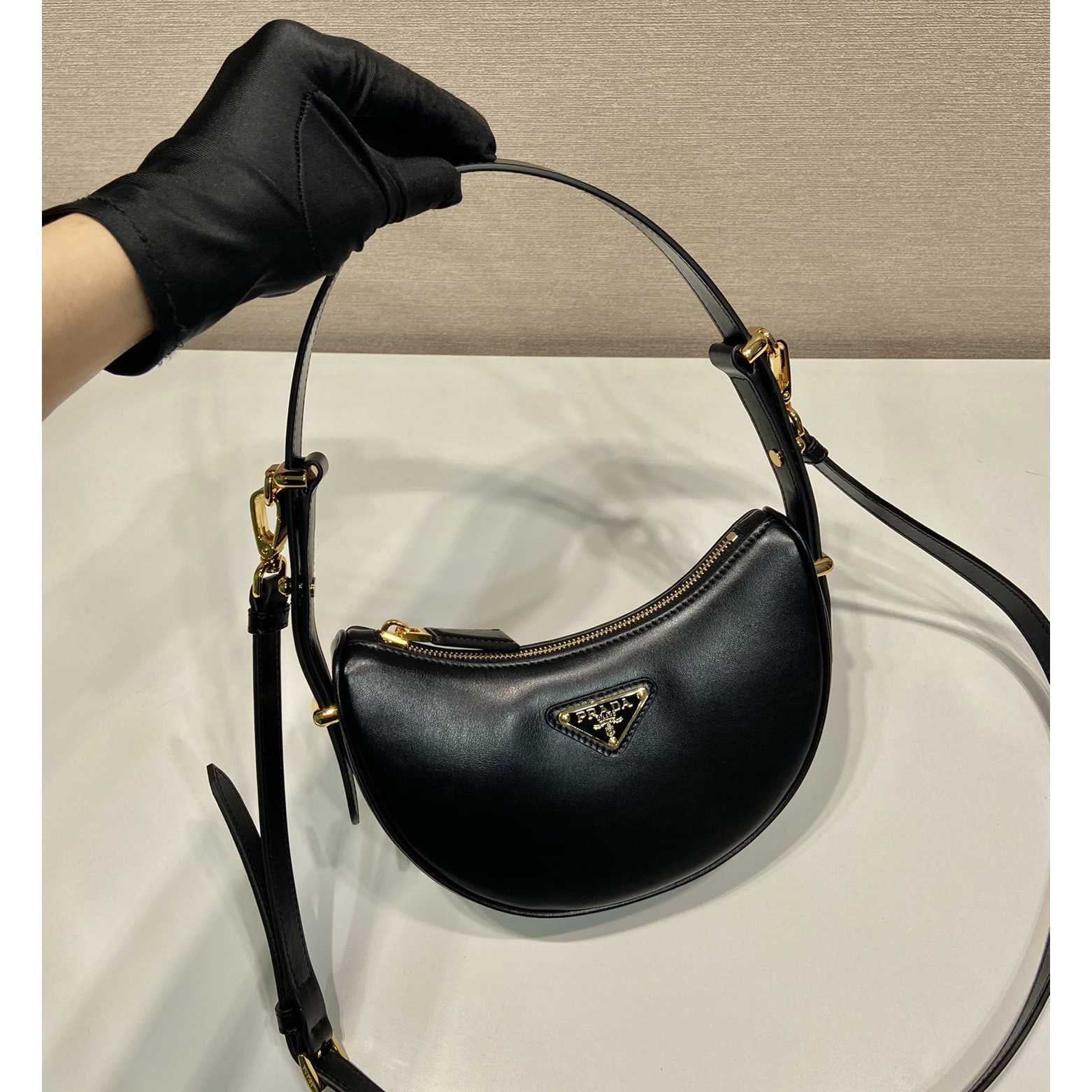 Prada Arqué Leather Mini Shoulder Bag - FashionPlug