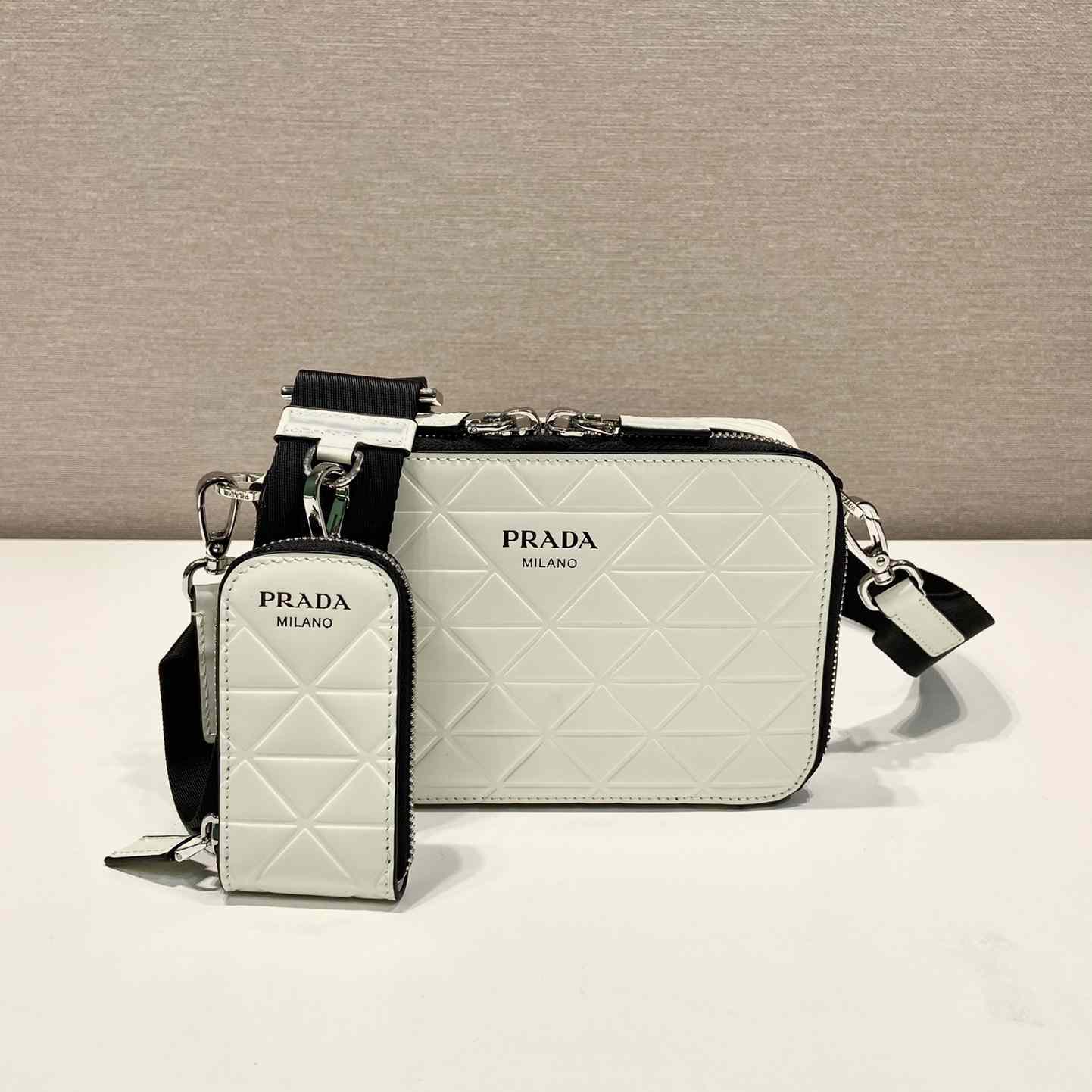 Prada Brique Brushed Leather Bag With Triangle Motif - FashionPlug