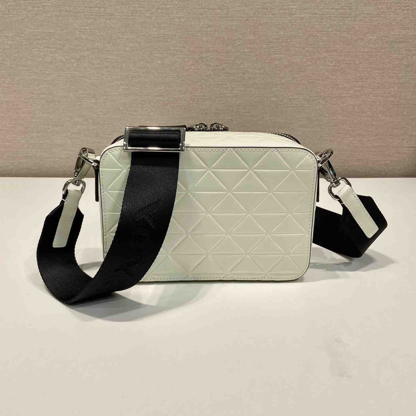 Prada Brique Brushed Leather Bag With Triangle Motif - FashionPlug
