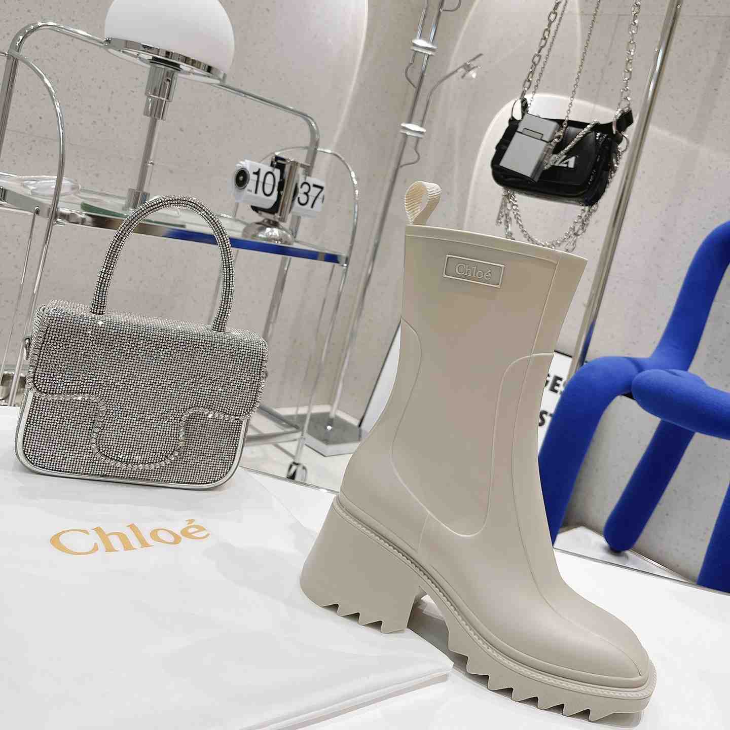 Chloe Debossed-logo Chunky Boots - FashionPlug