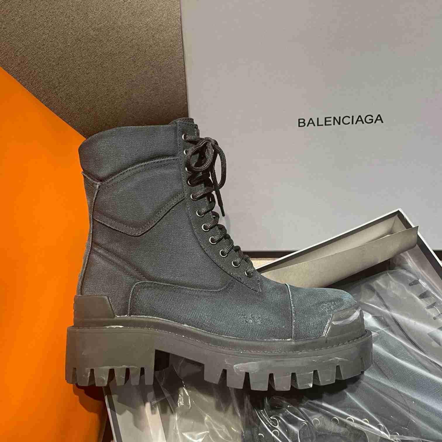 Balenciaga Worn-effect Combat Boots - FashionPlug