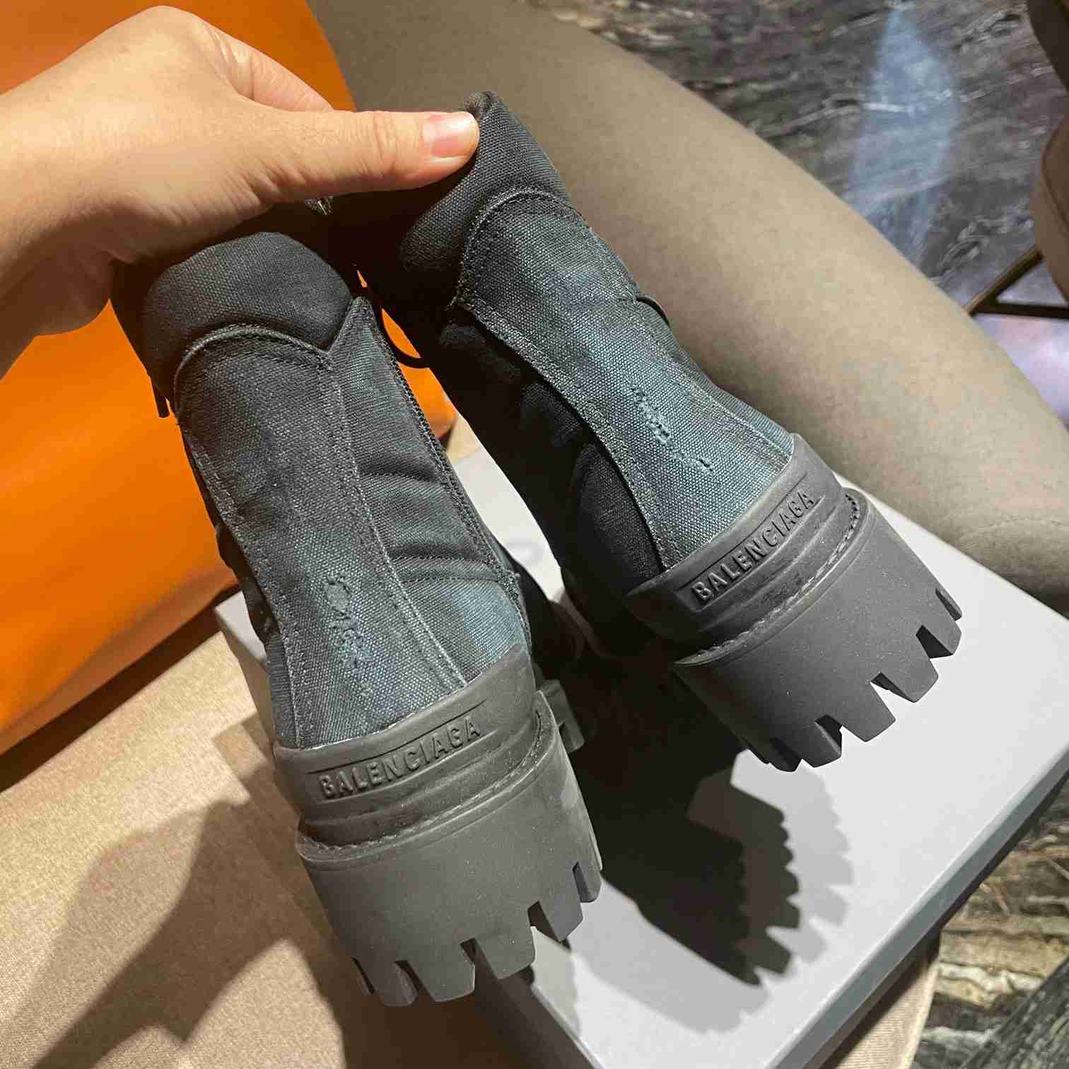Balenciaga Worn-effect Combat Boots - FashionPlug