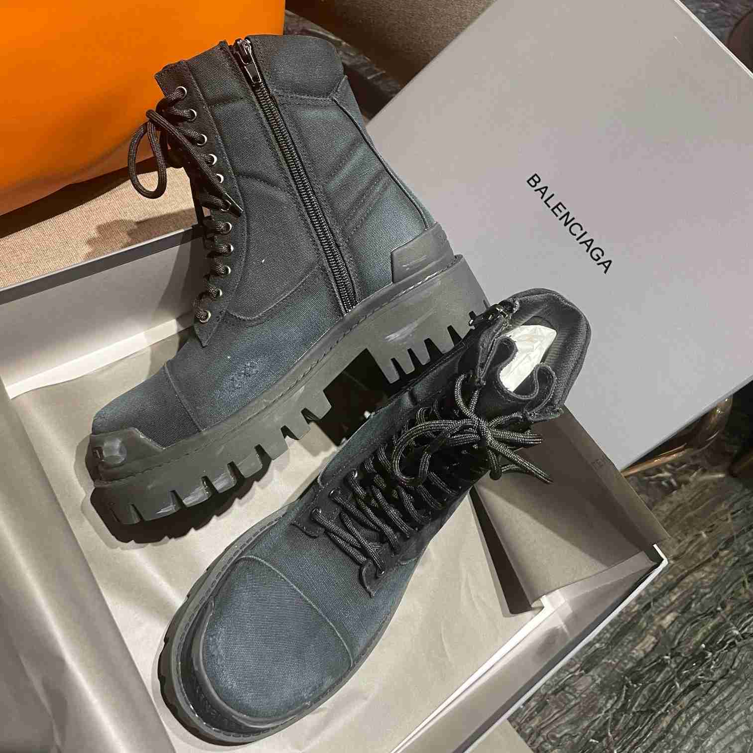 Balenciaga Worn-effect Combat Boots - FashionPlug