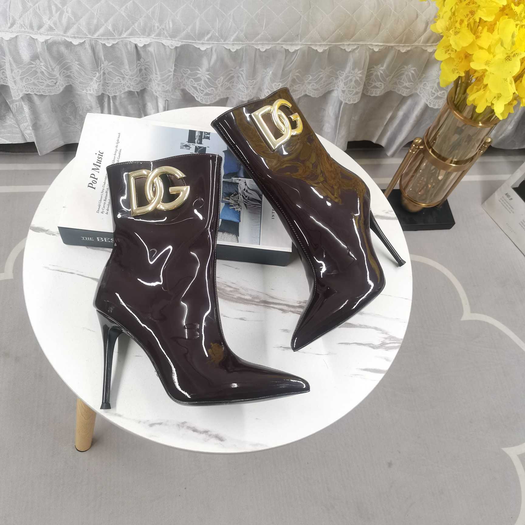 Dolce & Gabbana Calfskin Ankle Boots - FashionPlug