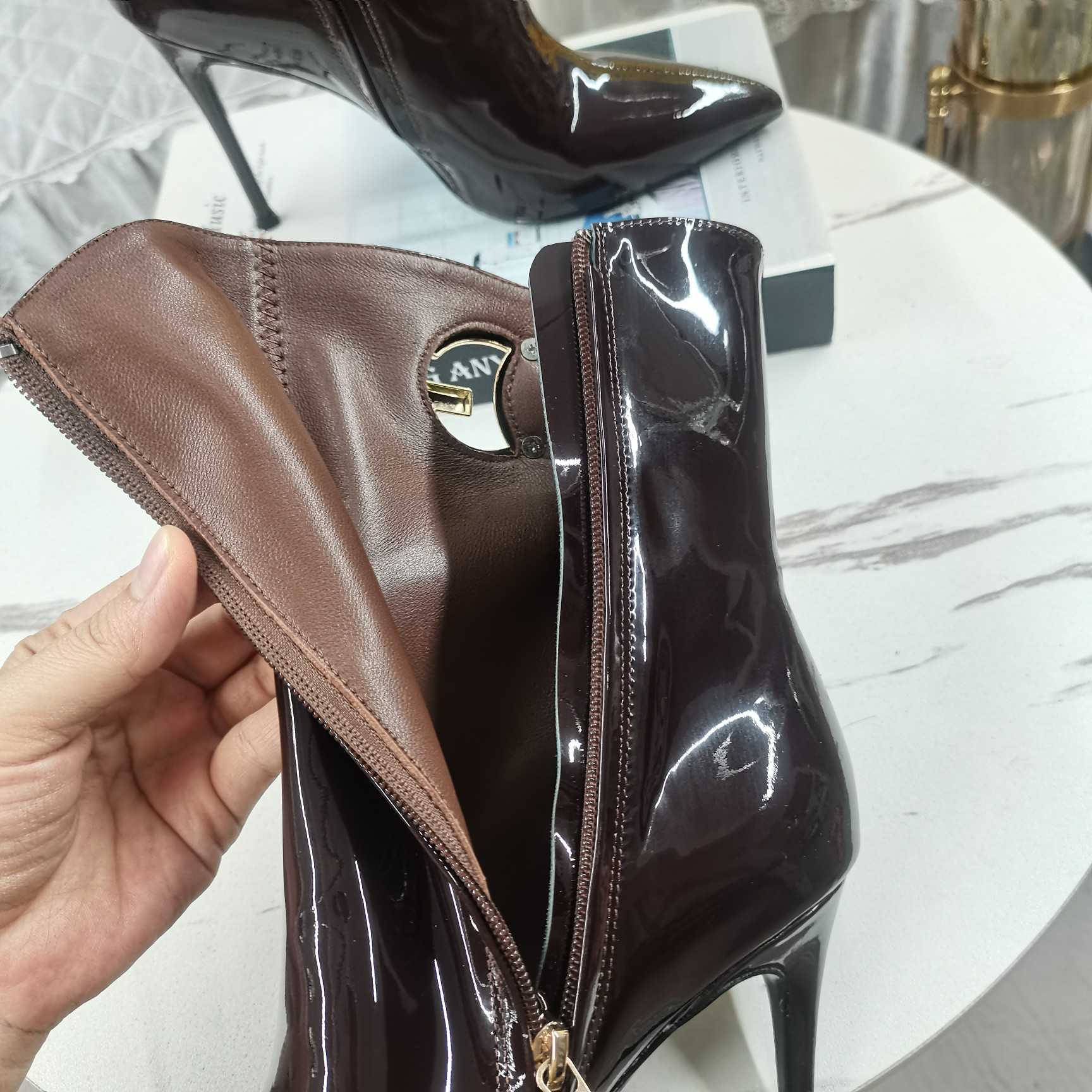 Dolce & Gabbana Calfskin Ankle Boots - FashionPlug