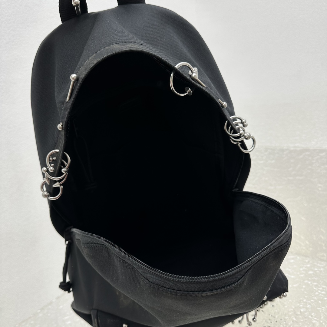 Balenciaga Explorer Backpack With Piercings In Black - FashionPlug