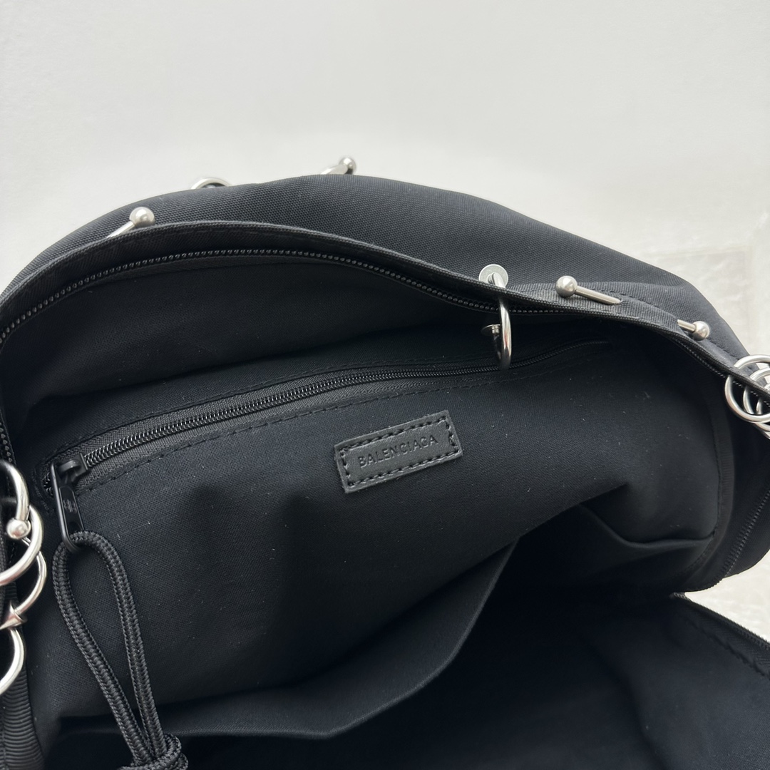 Balenciaga Explorer Backpack With Piercings In Black - FashionPlug