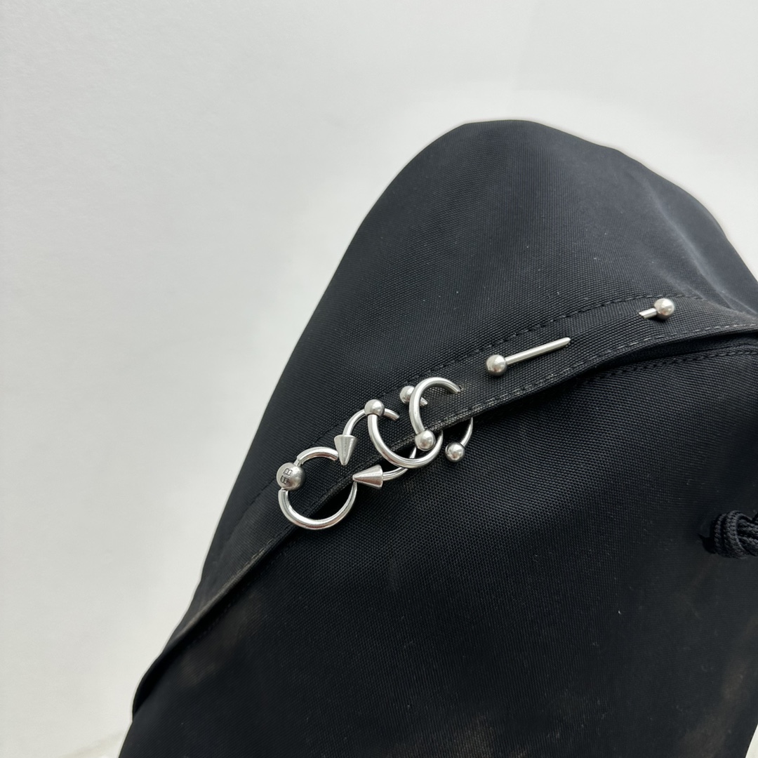 Balenciaga Explorer Backpack With Piercings In Black - FashionPlug