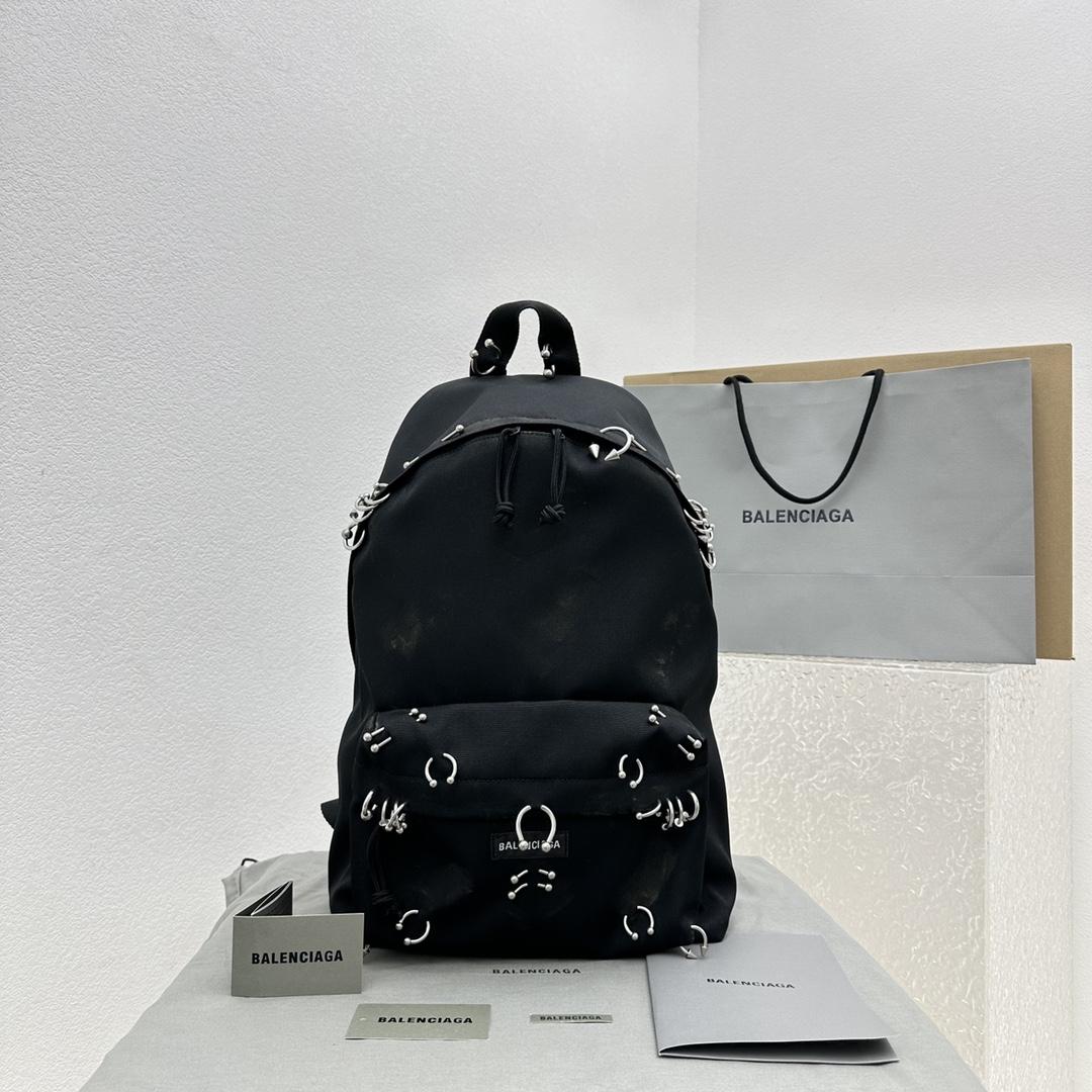 Balenciaga Explorer Backpack With Piercings In Black - FashionPlug