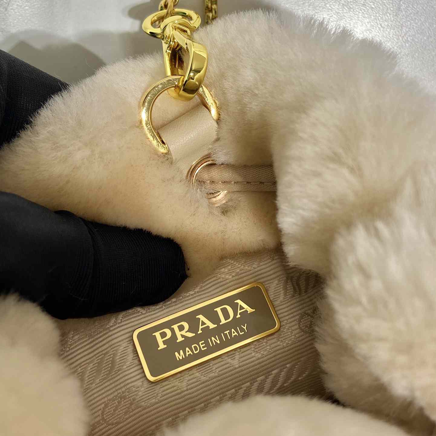 Prada Shearling Mini-pouch - FashionPlug