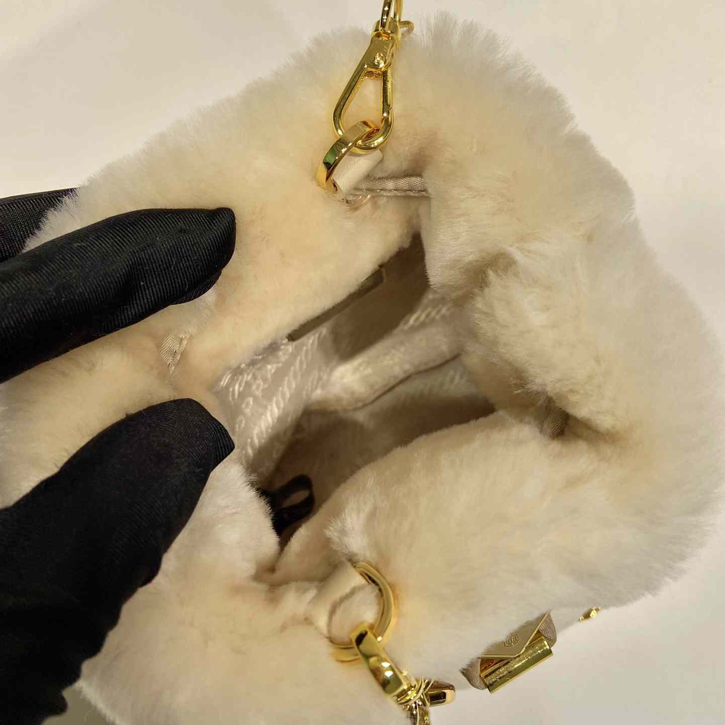 Prada Shearling Mini-pouch - FashionPlug