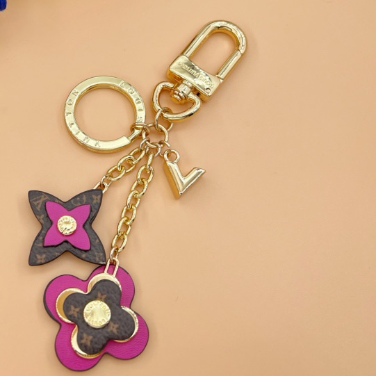 Louis Vuitton Blooming Flowers Bag Charm and Key Holder   M63084 - FashionPlug