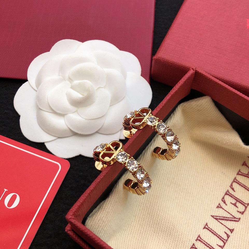 Valenti Vlogo Signature metal and Swarovski® crystal earrings - FashionPlug