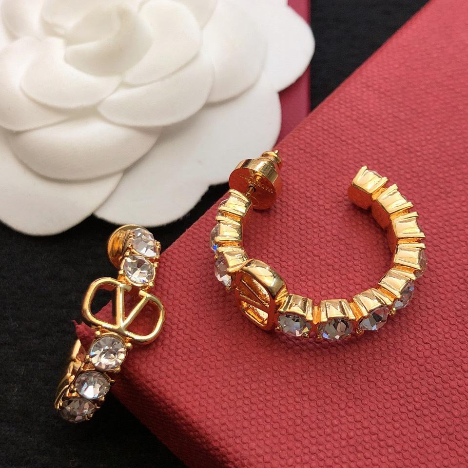 Valenti Vlogo Signature metal and Swarovski® crystal earrings - FashionPlug