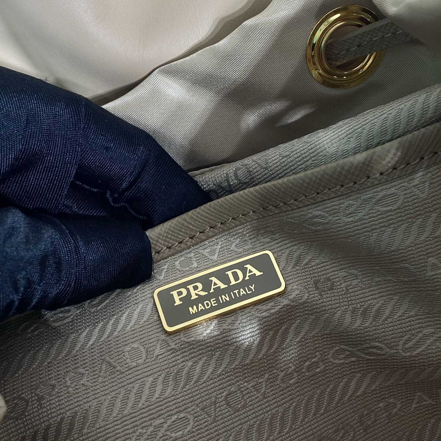 Prada Re-Nylon And Shearling Backpack - FashionPlug