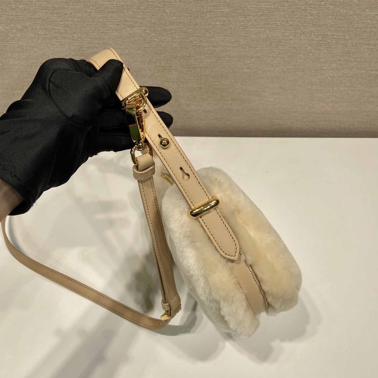 Prada Arqué Shearling And Leather Shoulder Bag - FashionPlug