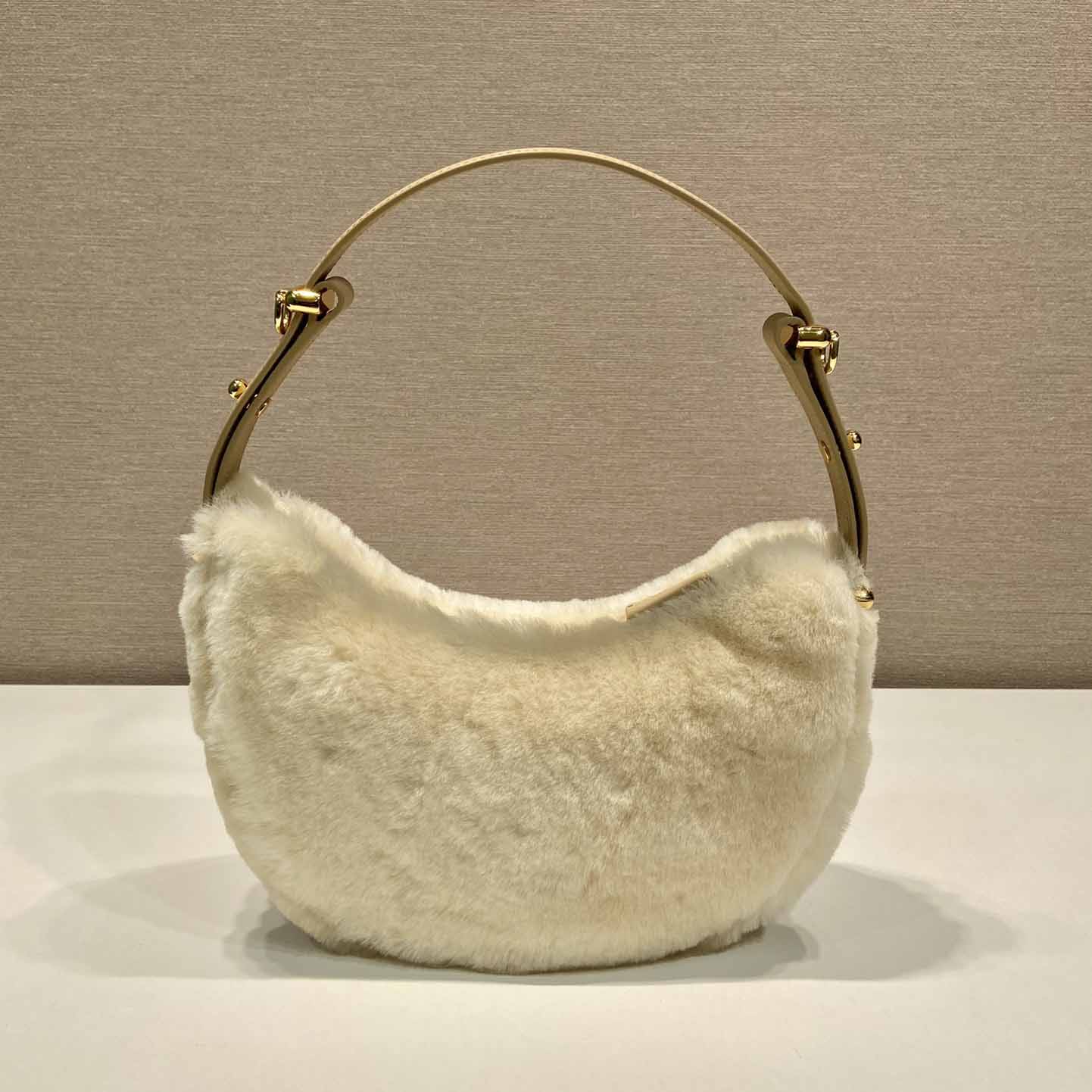 Prada Arqué Shearling And Leather Shoulder Bag - FashionPlug