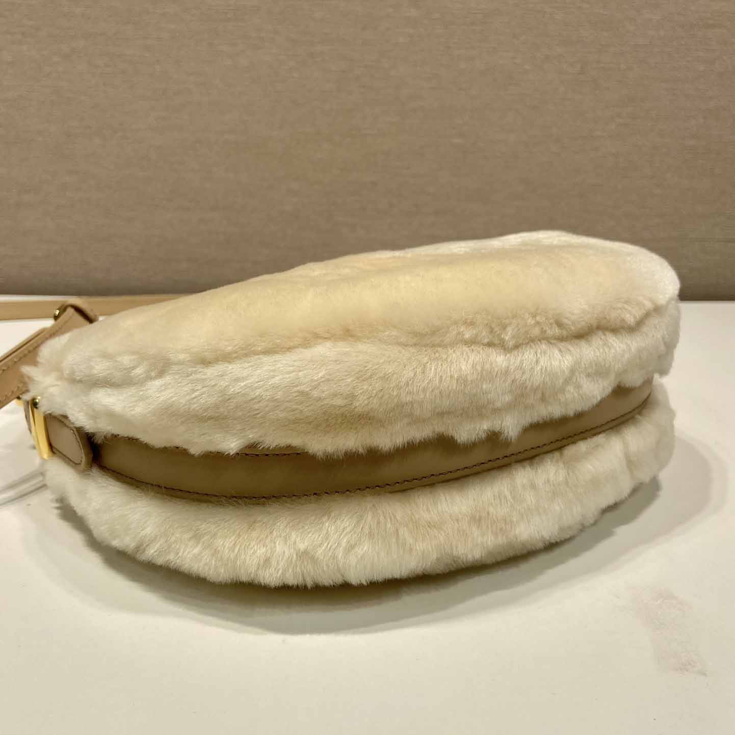 Prada Arqué Shearling And Leather Shoulder Bag - FashionPlug