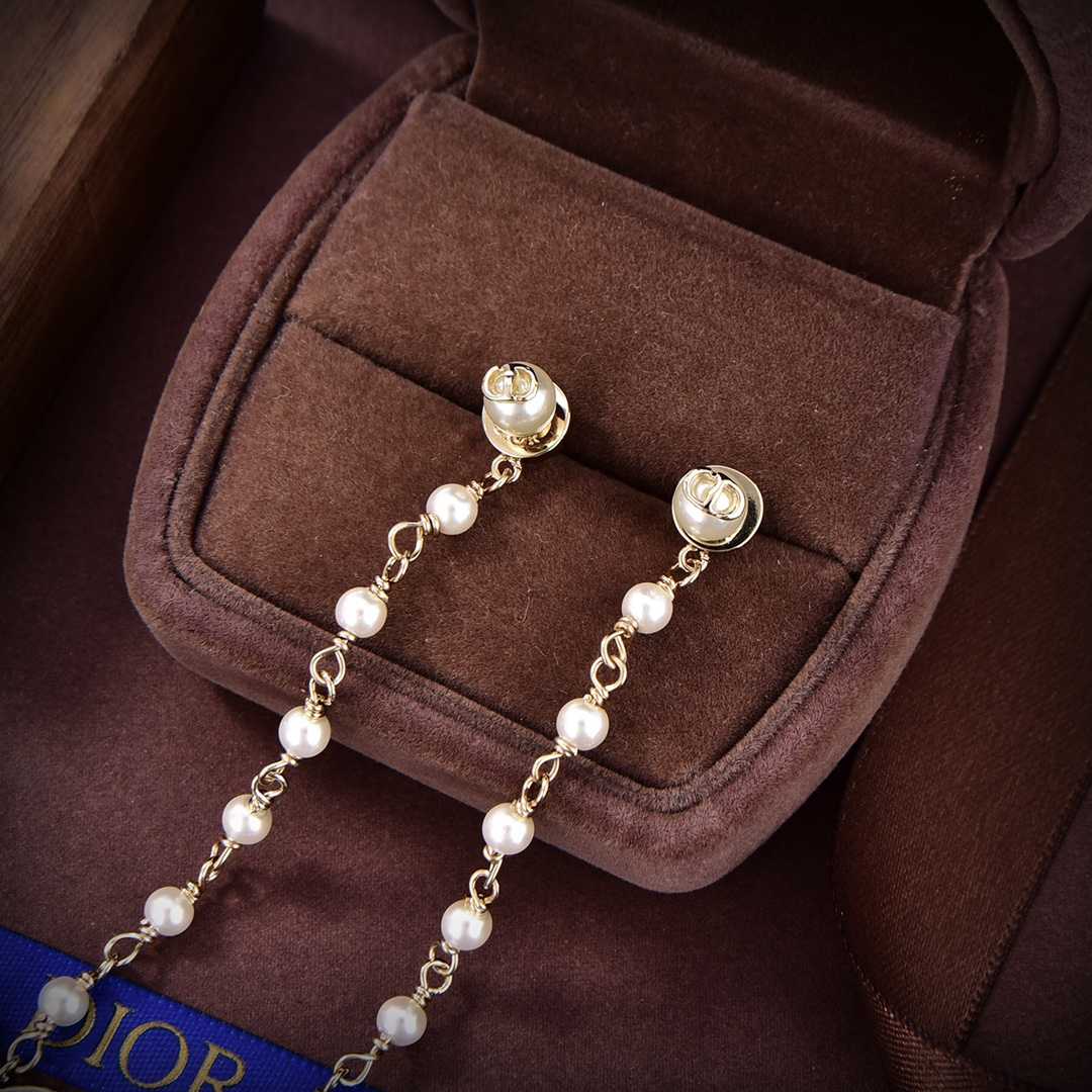 Dior Métamorphose Earrings - FashionPlug