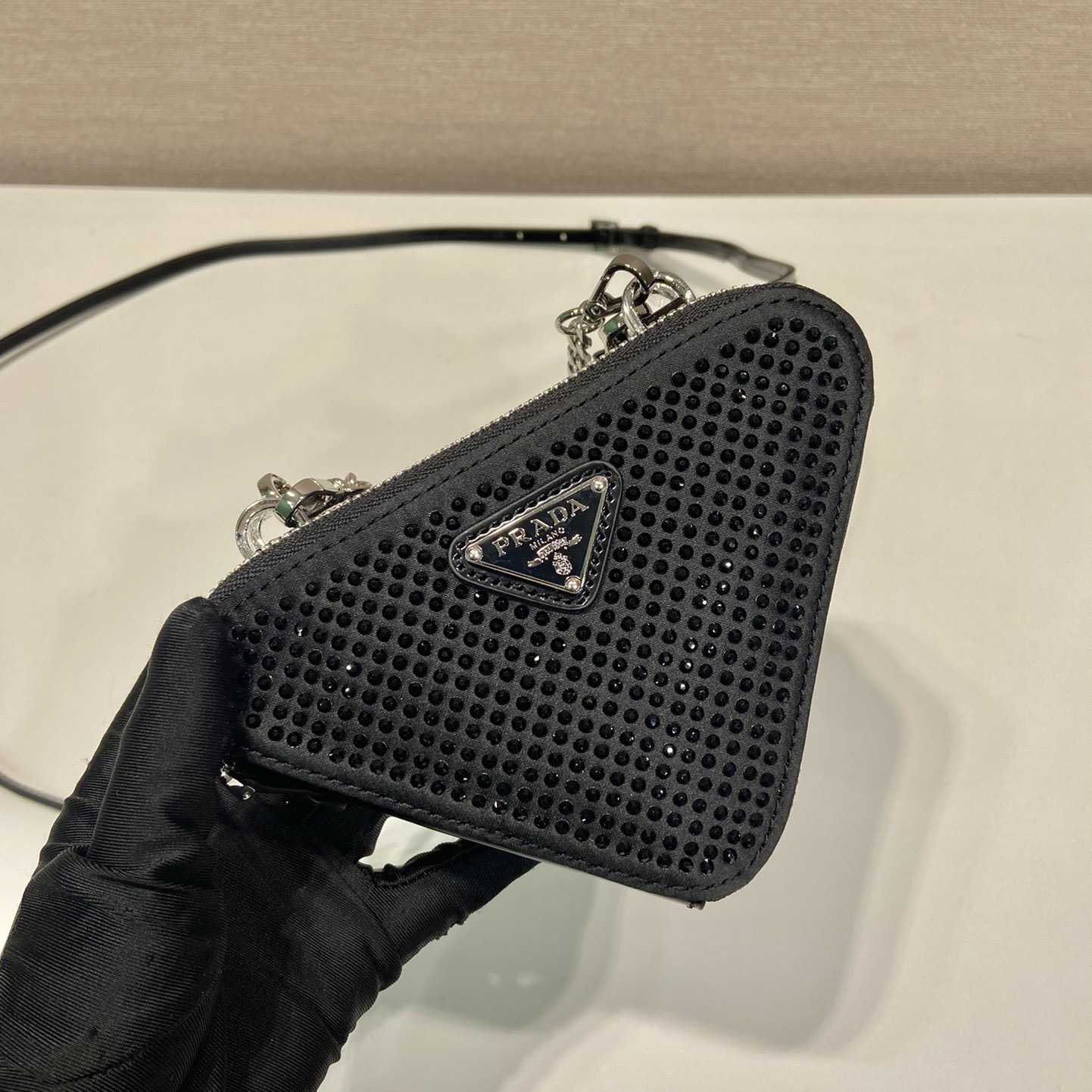 Prada Triangular Embellished Satin And Leather Mini-pouch - FashionPlug